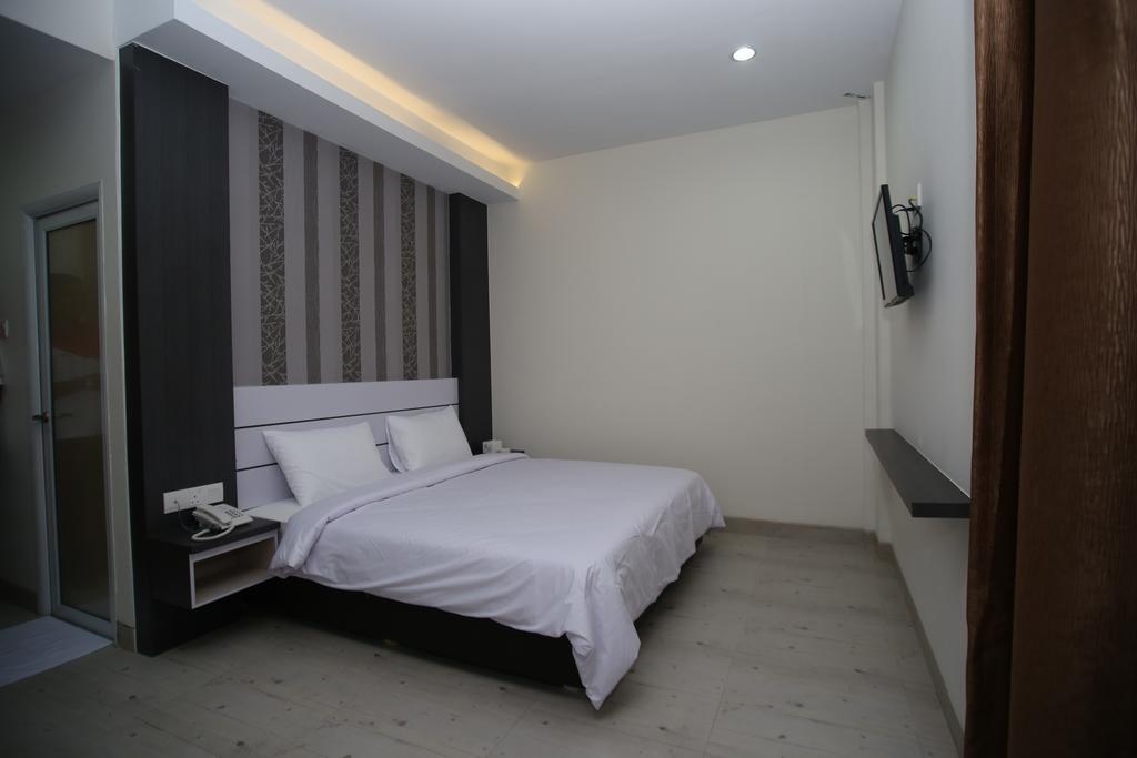 Redlink Hotel Batam Room photo
