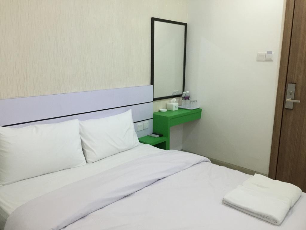 Redlink Hotel Batam Room photo