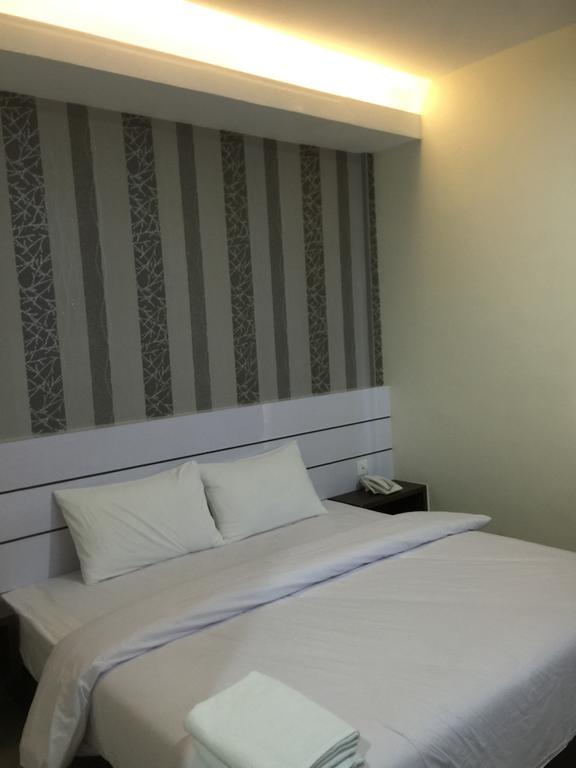 Redlink Hotel Batam Room photo