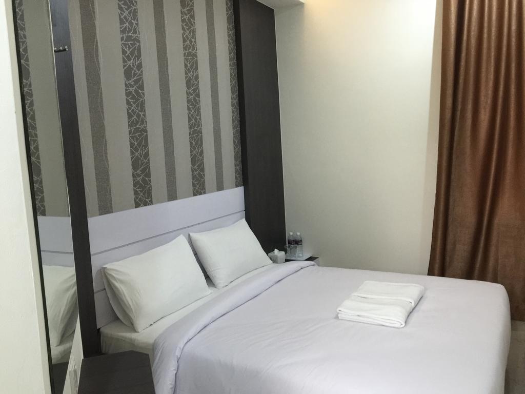 Redlink Hotel Batam Room photo